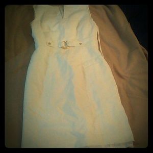 Beautiful white dress with gold buckle