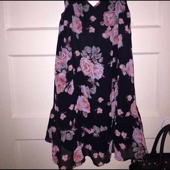 Floral flair "spaghetti" cross strap dress.