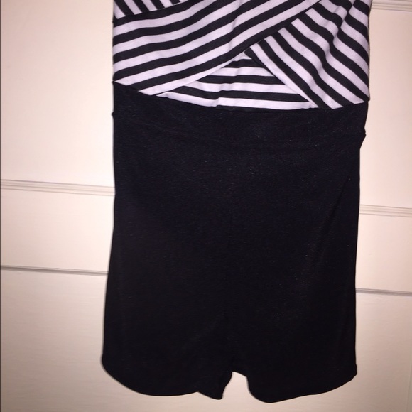 Sleeveless black and white romper.
