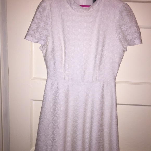 All white lace flare dress.