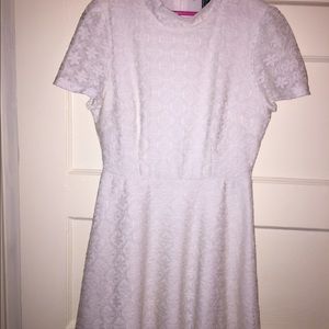 All white lace flare dress.