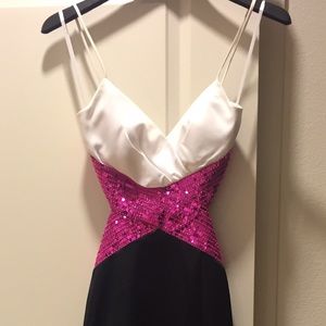 Sexy black, pink, and white mermaid evening gown.