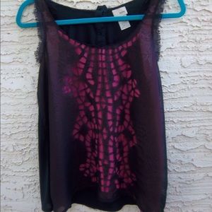Pink and black sleeveless blouse