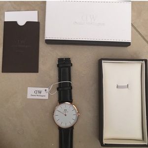 Black leather Daniel Wellington watch