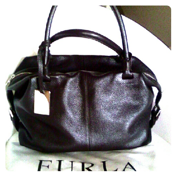 Brilliant brown purse. Dust bag included.