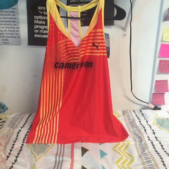 red Cameroon racing tank.