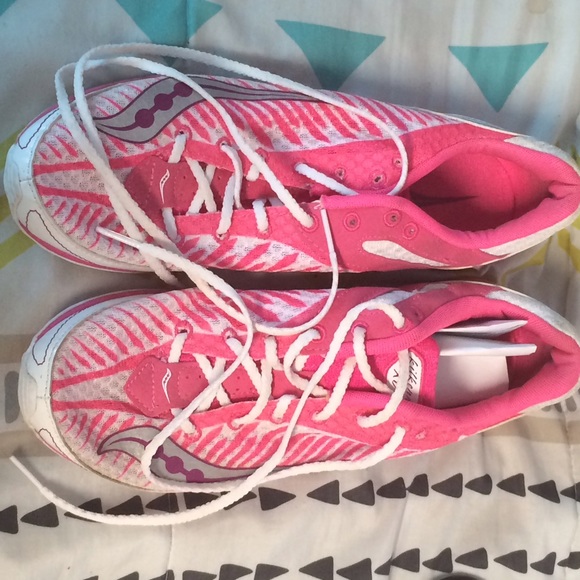 pink cross country spikes.