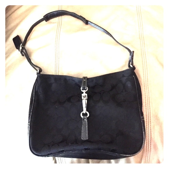 Black front clasp Coach purse