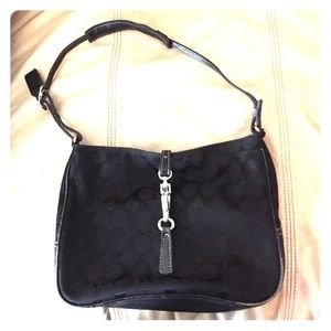 Black front clasp Coach purse