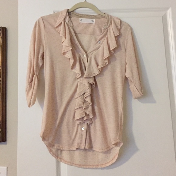 Soft cream ruffle top