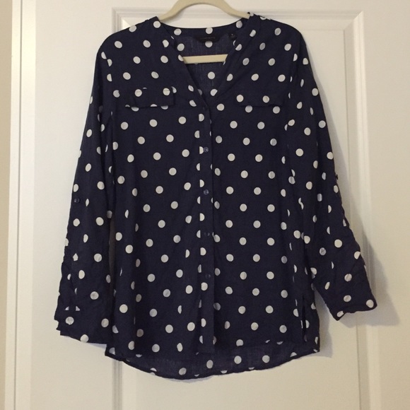 Navy and white polka dot blouse.