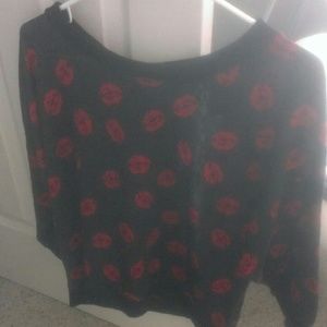 Sheer black lace back kiss top