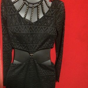 Black cutout dress w/ lace and detail stud front .