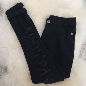 Black destroyed jeans