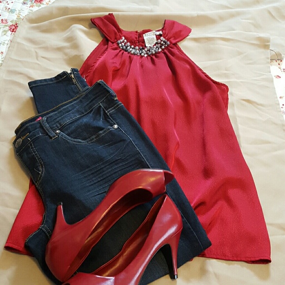 Red sleeveless blouse