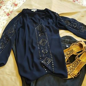 Navy jeweled blouse.