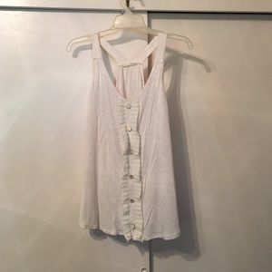 Cream color tank top with a nautical theme.