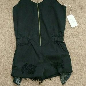 Blue romper with sequin pockets