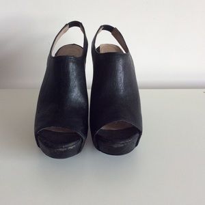 Gorgeous black leather wedge heels