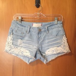 Jean shorts with lace detailing on side!