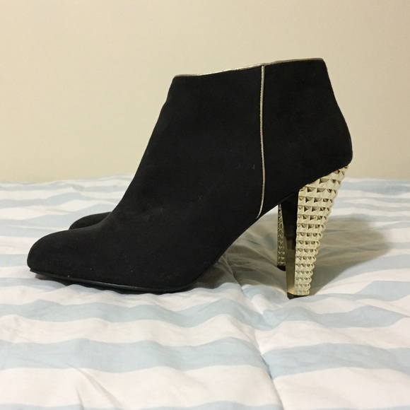 Scene black suede booties with golden soles