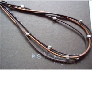 Retired Silpada tri-strand brown leather necklace