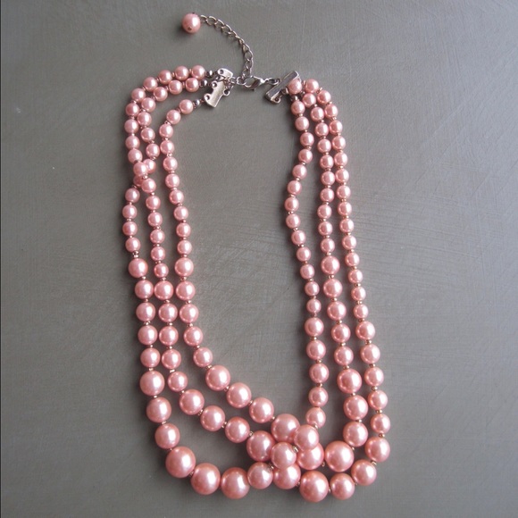 Peach colored multi strand pearl necklace