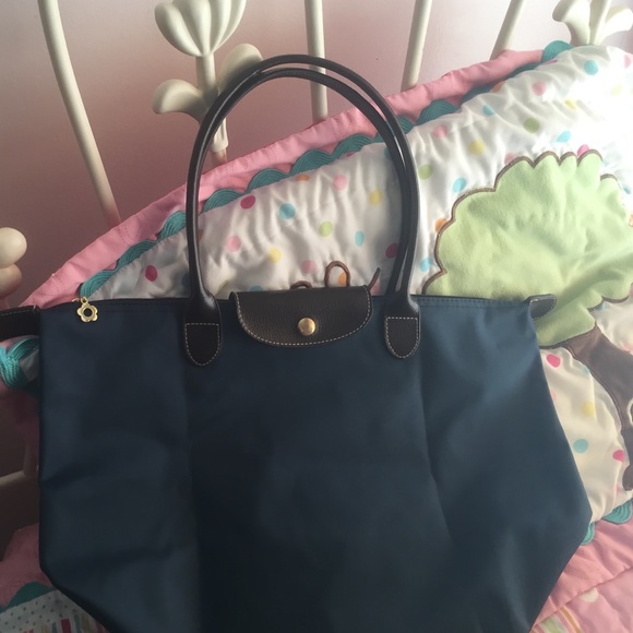 A navy blue bag. Suitable for casual outings.