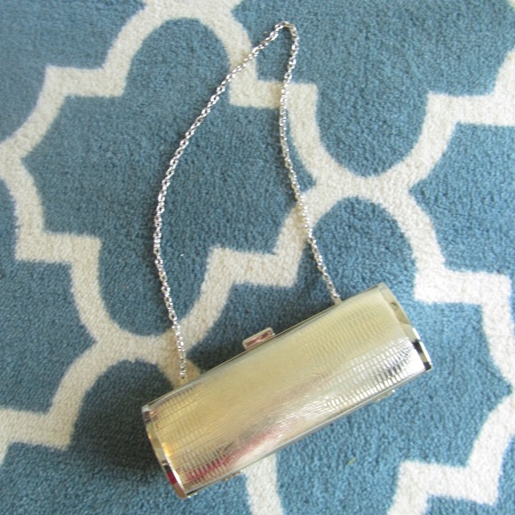 Gold snake skin patterned clutch