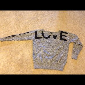 Torrid wide neck "Love" sweater.