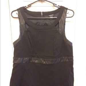 Black Torrid peplum top with pleather trim