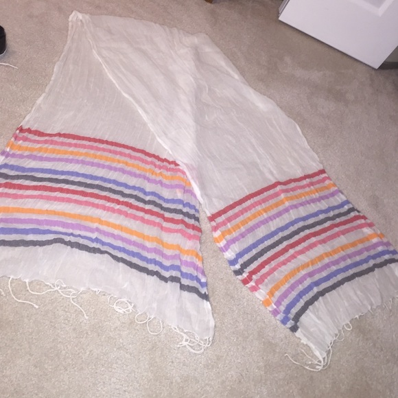 White scarf with colors at each end