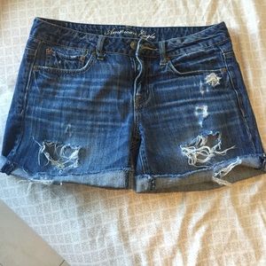 AE distressed denim cut offs