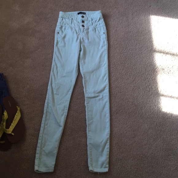 Skinny teal jeans