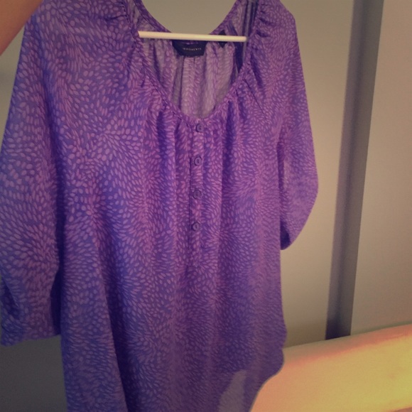 Perfect for spring! Purple blouse with self print.