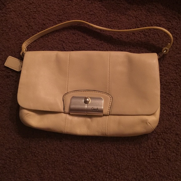 COACH yellow large wristlet