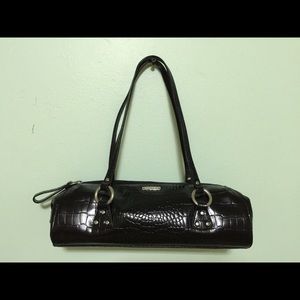 Ralph Lauren faux leather with snake pattern.