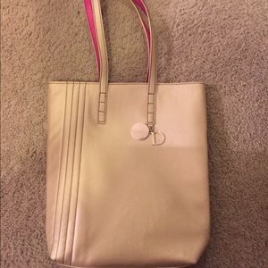 Gold Dior beauty bag
