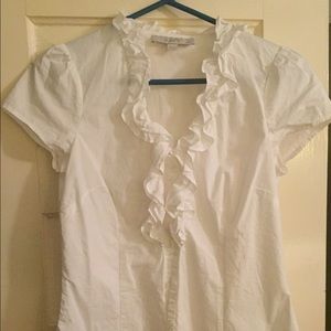 White ruffle button down top