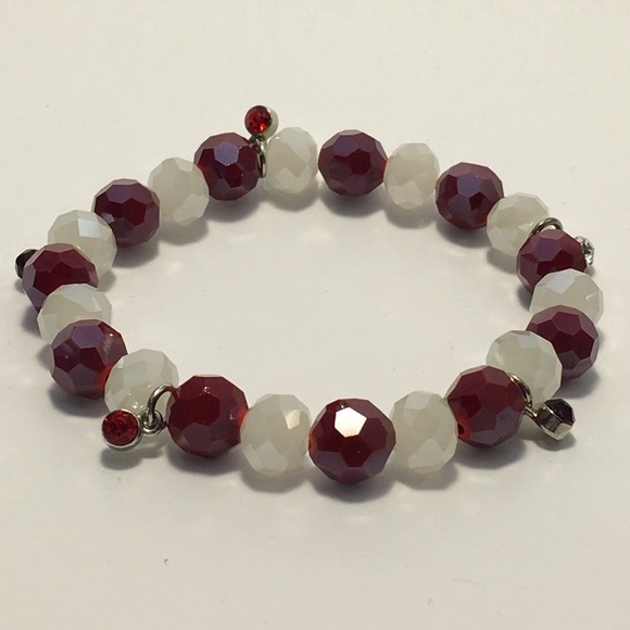 Pearlescent red and white beads with charms!