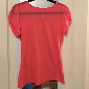 Express small solid corral top with sheer neckline