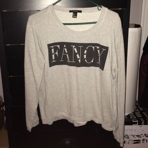 A graphic tee sweatshirt with studs