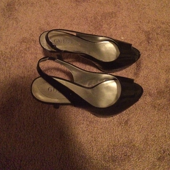 Guess black heels like new in great condition.