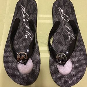 Micharl Kors Black Flip Flops size 7