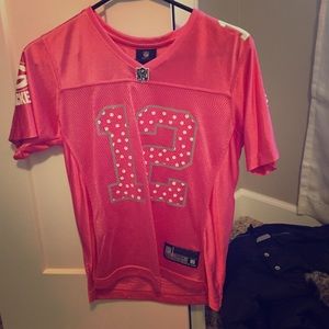 Pink packer jersey