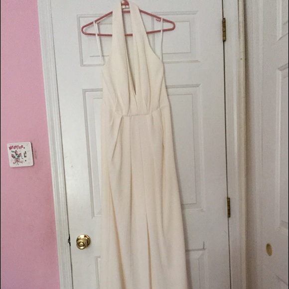 A beautiful, deep V, white cocktail dress.