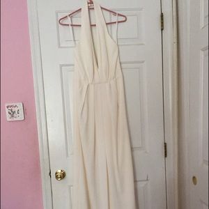 A beautiful, deep V, white cocktail dress.