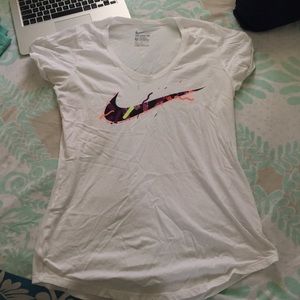 Nike athletic cut white t-shirt with Nike logo.