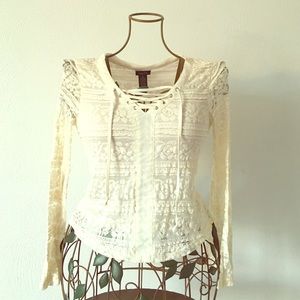 Creme long sleeve lace-up top