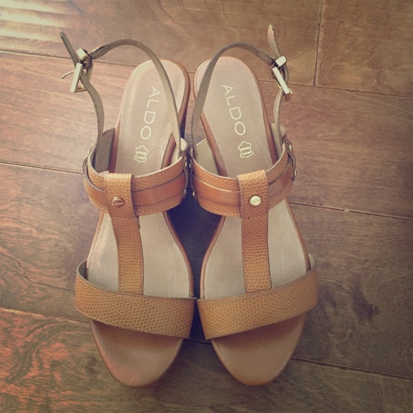 Brand new. Never worn wedges